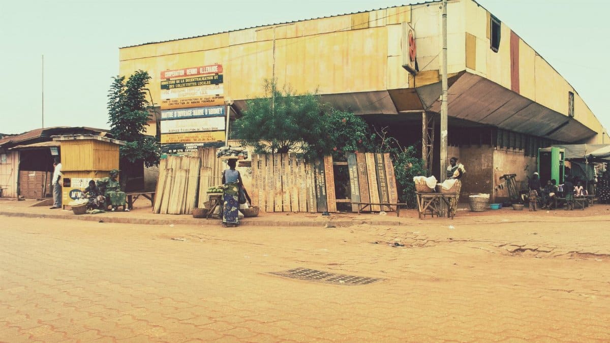 Street corner with a vibrant market scene showcasing everyday life in an urban setting.