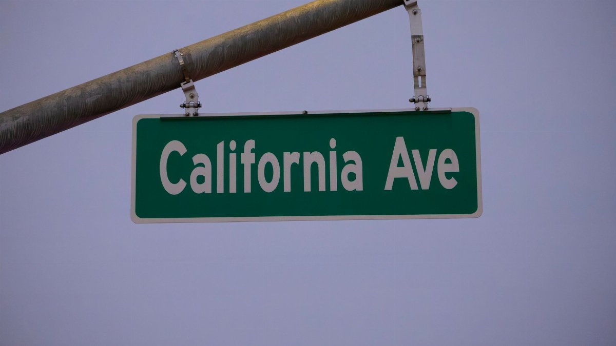 Image of California Avenue street sign against a twilight sky.
